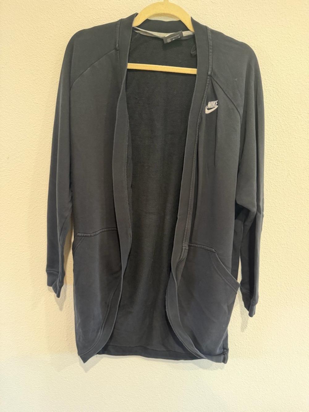 Nike black sweatshirt with white logo and gray trim